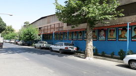 حکایت جاودانه شدن ۸۵ تصویر نقاشی شهید روی یک دیوار | چرا نانوای محله دنبال عکس پرسنلی شهدا بود؟
