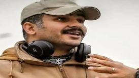 لحظه زیر گرفته‌شدن عکاس در پیست اتومبیلرانی آزادی